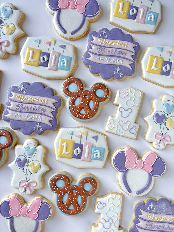 Hand-decorated Disney themed cookies for a first birthday