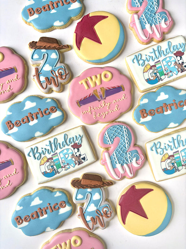 Hand-decorated birthday cookies with a Toy Story theme