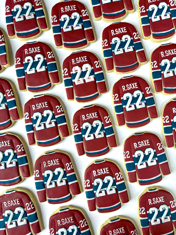Cookies decorated as a Montreal Canadiens hockey jersey with the number 22 on the back