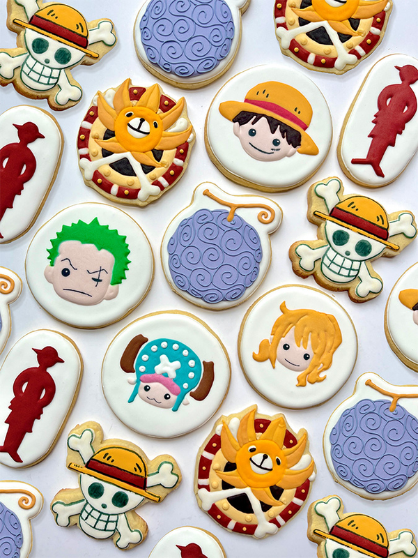 A collection of cookies, hand-decorated in the style of One Piece characters