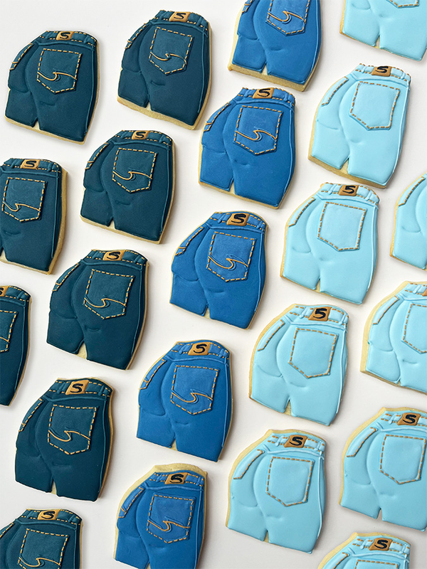 Blue jean shaped cookies in light and dark shades of denim
